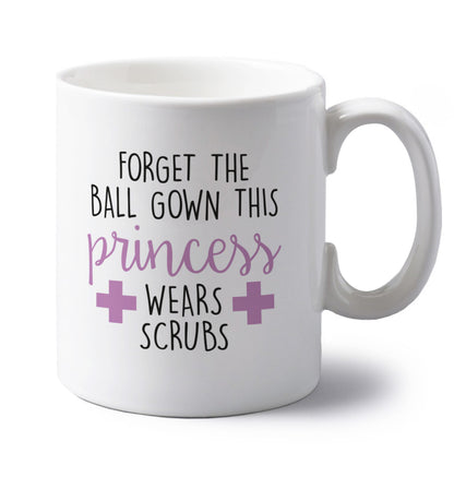 Forget the ball gown this princess wears scrubs left handed white ceramic mug 
