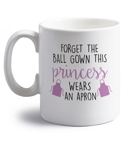 Forget the ball gown this princess wears an apron right handed white ceramic mug 