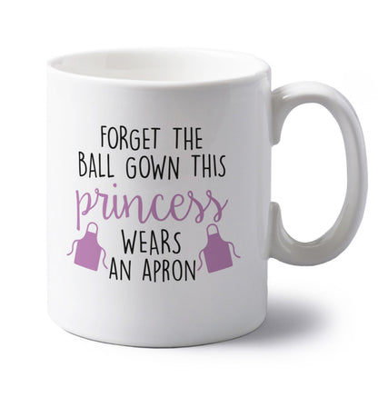 Forget the ball gown this princess wears an apron left handed white ceramic mug 