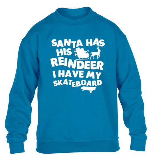 Santa has his reindeer I have my skateboard children's blue sweater 12-14 Years