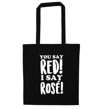 You say red I say ros√É¬© black tote bag