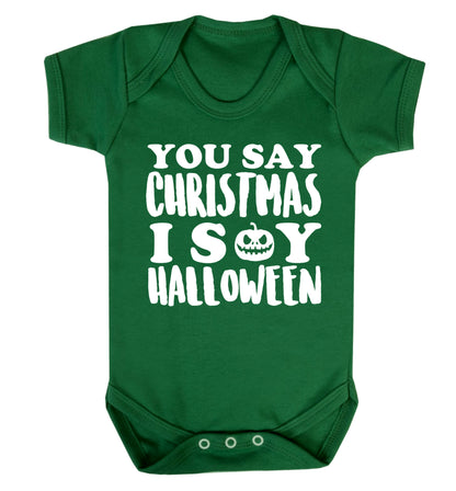You say christmas I say halloween! Baby Vest green 18-24 months