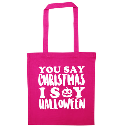 You say christmas I say halloween! pink tote bag