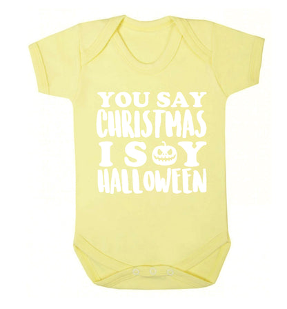 You say christmas I say halloween! Baby Vest pale yellow 18-24 months