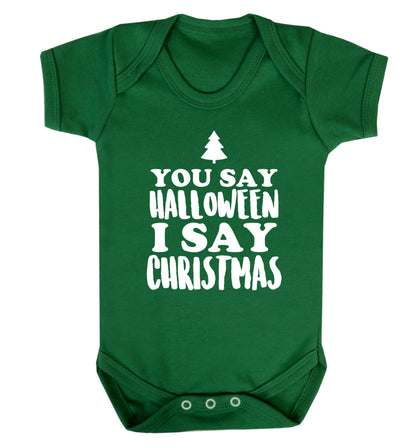 You say halloween I say christmas! Baby Vest green 18-24 months