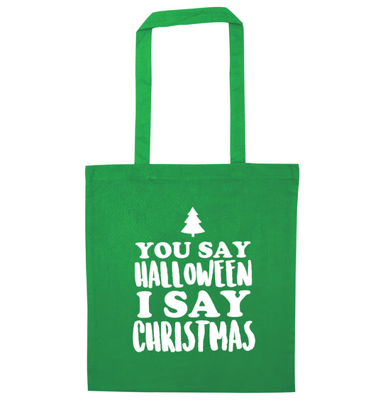 You say halloween I say christmas! green tote bag