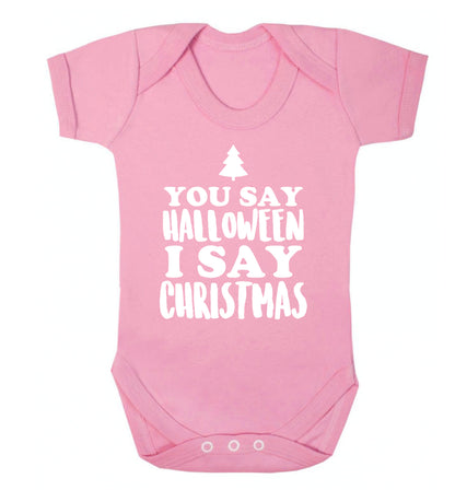 You say halloween I say christmas! Baby Vest pale pink 18-24 months
