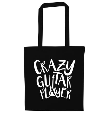 Crazy guitar player black tote bag