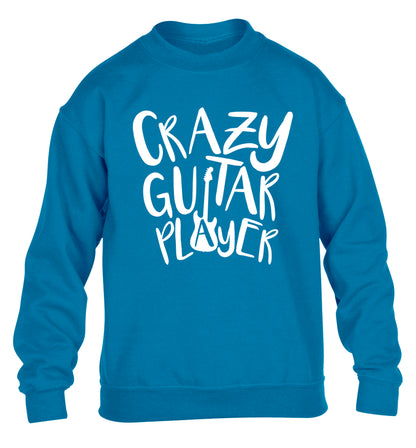 Crazy guitar player children's blue sweater 12-14 Years