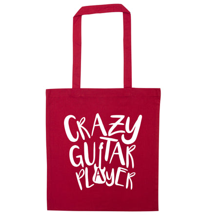 Crazy guitar player red tote bag