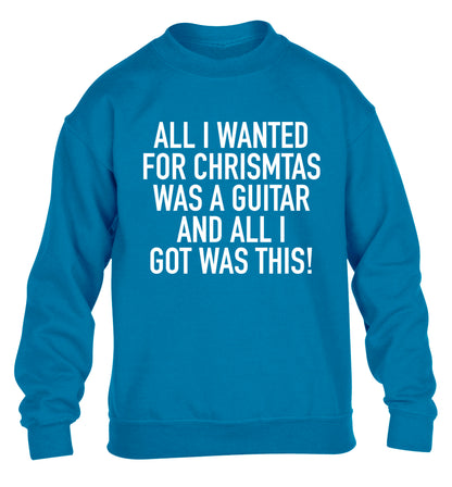 All I wanted for Christmas was a guitar and all I got was this! children's blue sweater 12-14 Years