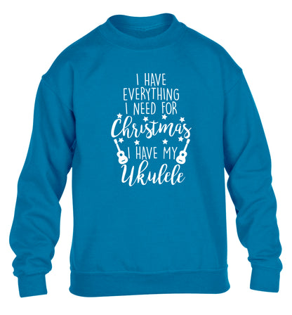 I have everything I need for Christmas I have my ukulele children's blue sweater 12-14 Years