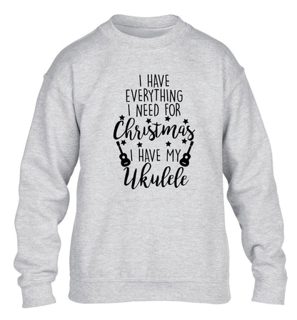 I have everything I need for Christmas I have my ukulele children's grey sweater 12-14 Years