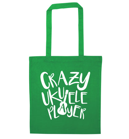 Crazy ukulele player green tote bag