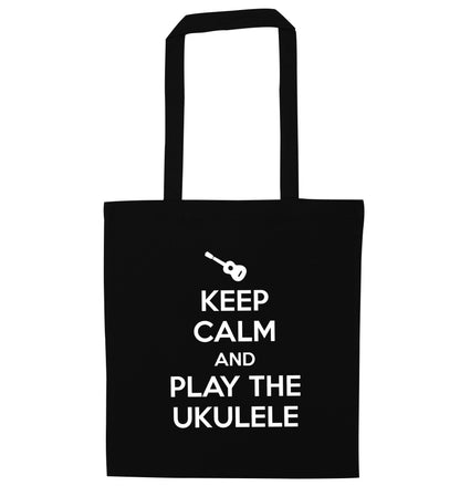 Keep calm and play the ukulele black tote bag