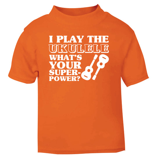 I play the ukulele what's your superpower? orange Baby Toddler Tshirt 2 Years