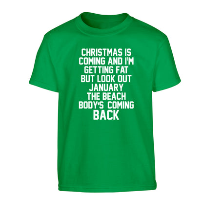 Christmas is coming and I'm getting fat but look out January the beach body's coming back! Children's green Tshirt 12-14 Years
