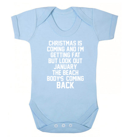 Christmas is coming and I'm getting fat but look out January the beach body's coming back! Baby Vest pale blue 18-24 months