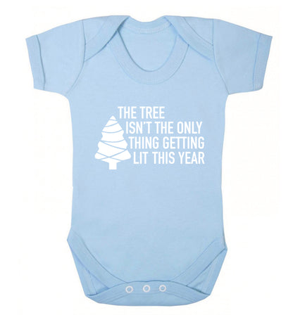 The tree isn't the only thing getting lit this year Baby Vest pale blue 18-24 months