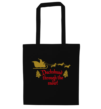 Dachshund through the snow black tote bag