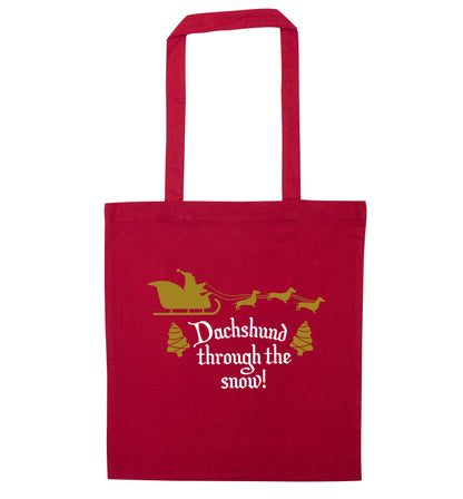Dachshund through the snow red tote bag