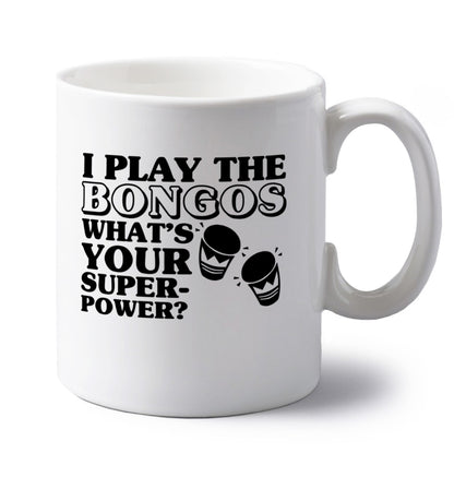 I play the bongos what's your superpower? left handed white ceramic mug 
