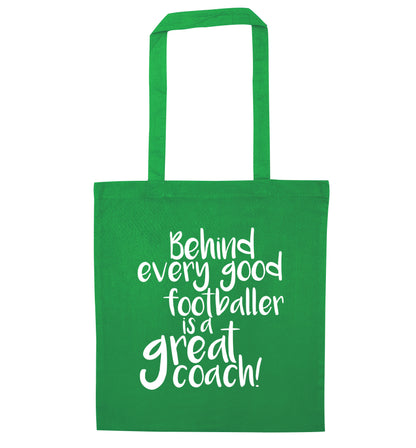 Behind every good footballer is a great coach! green tote bag
