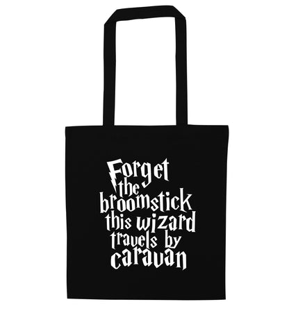 Forget the broomstick this wizard travels by caravan black tote bag