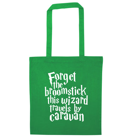 Forget the broomstick this wizard travels by caravan green tote bag