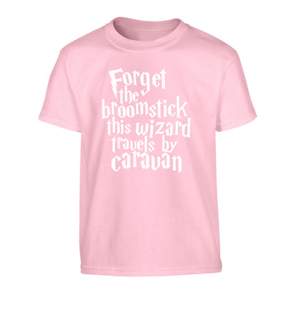 Forget the broomstick this wizard travels by caravan Children's light pink Tshirt 12-14 Years