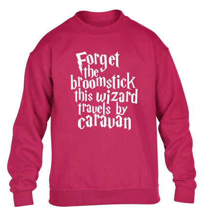 Forget the broomstick this wizard travels by caravan children's pink sweater 12-14 Years
