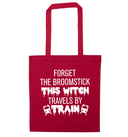 Forget the broomstick this witch travels by train red tote bag