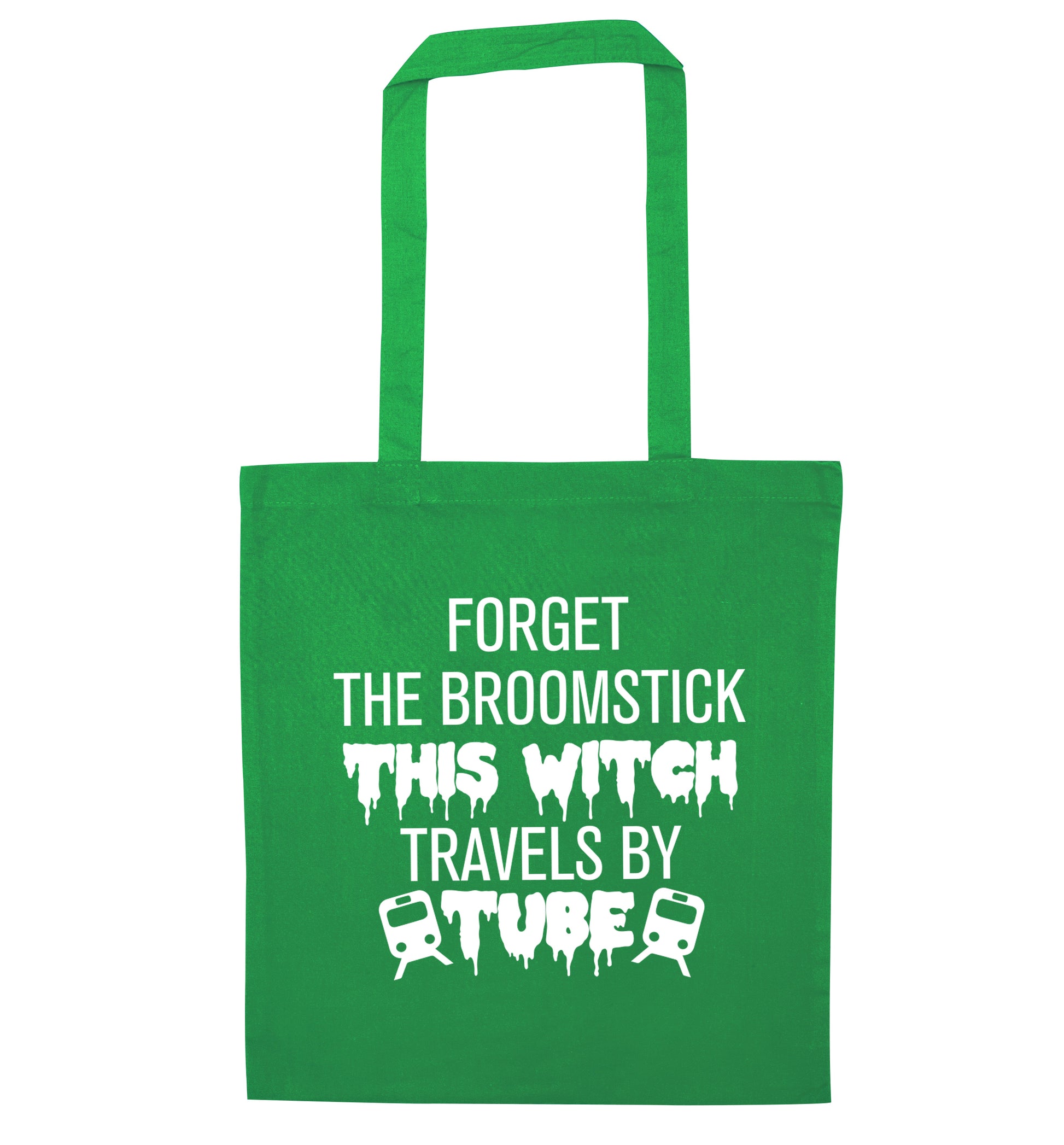 Forget the broomstick this witch travels by tube green tote bag