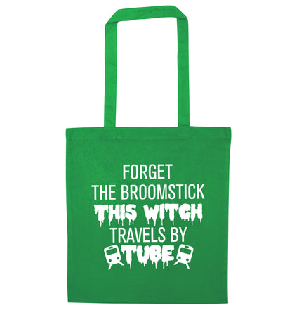 Forget the broomstick this witch travels by tube green tote bag