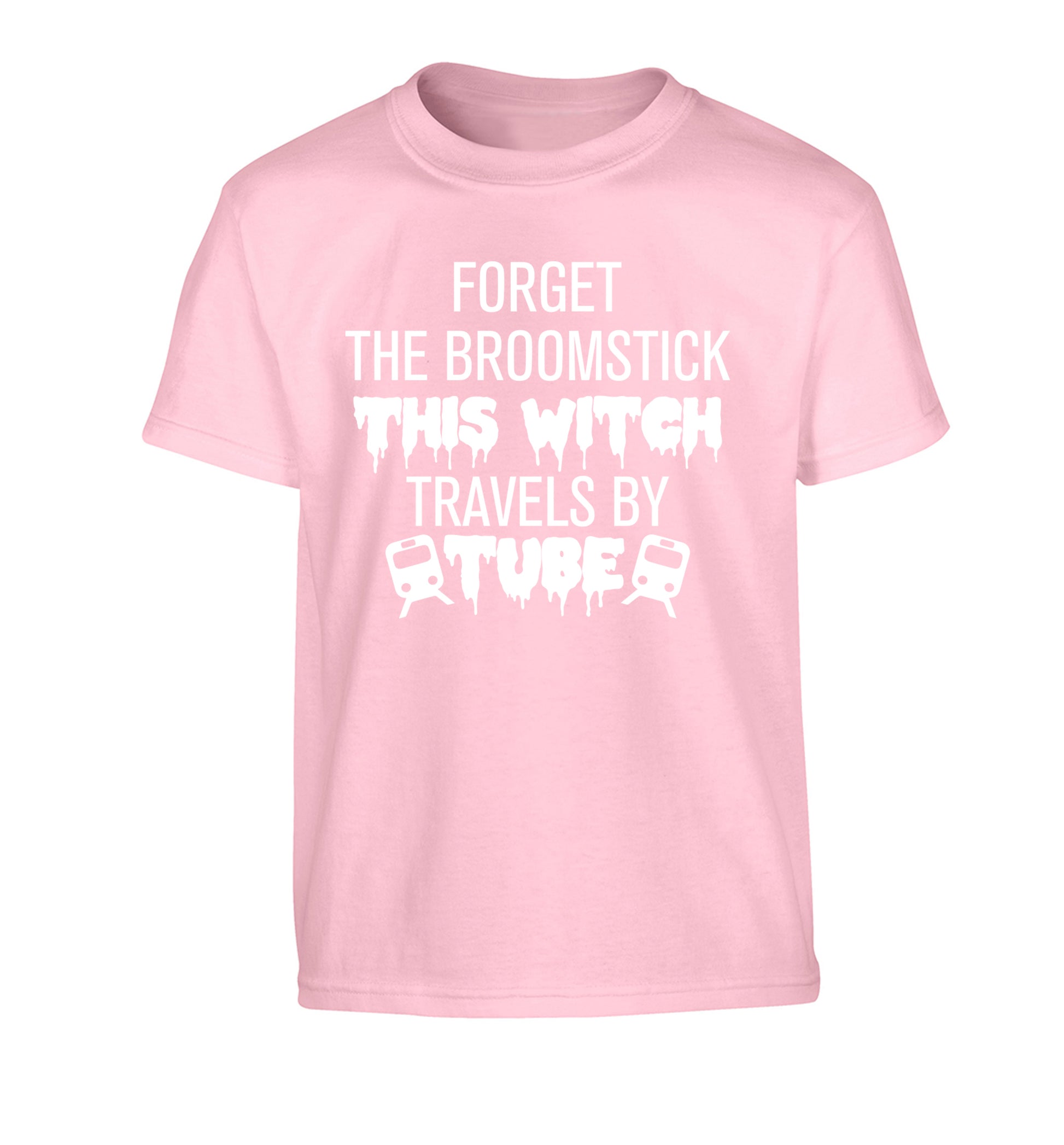Forget the broomstick this witch travels by tube Children's light pink Tshirt 12-14 Years