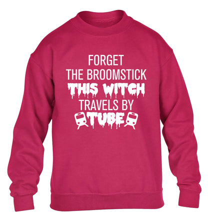 Forget the broomstick this witch travels by tube children's pink sweater 12-14 Years