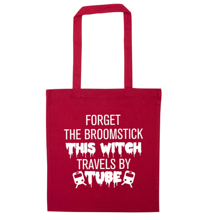 Forget the broomstick this witch travels by tube red tote bag