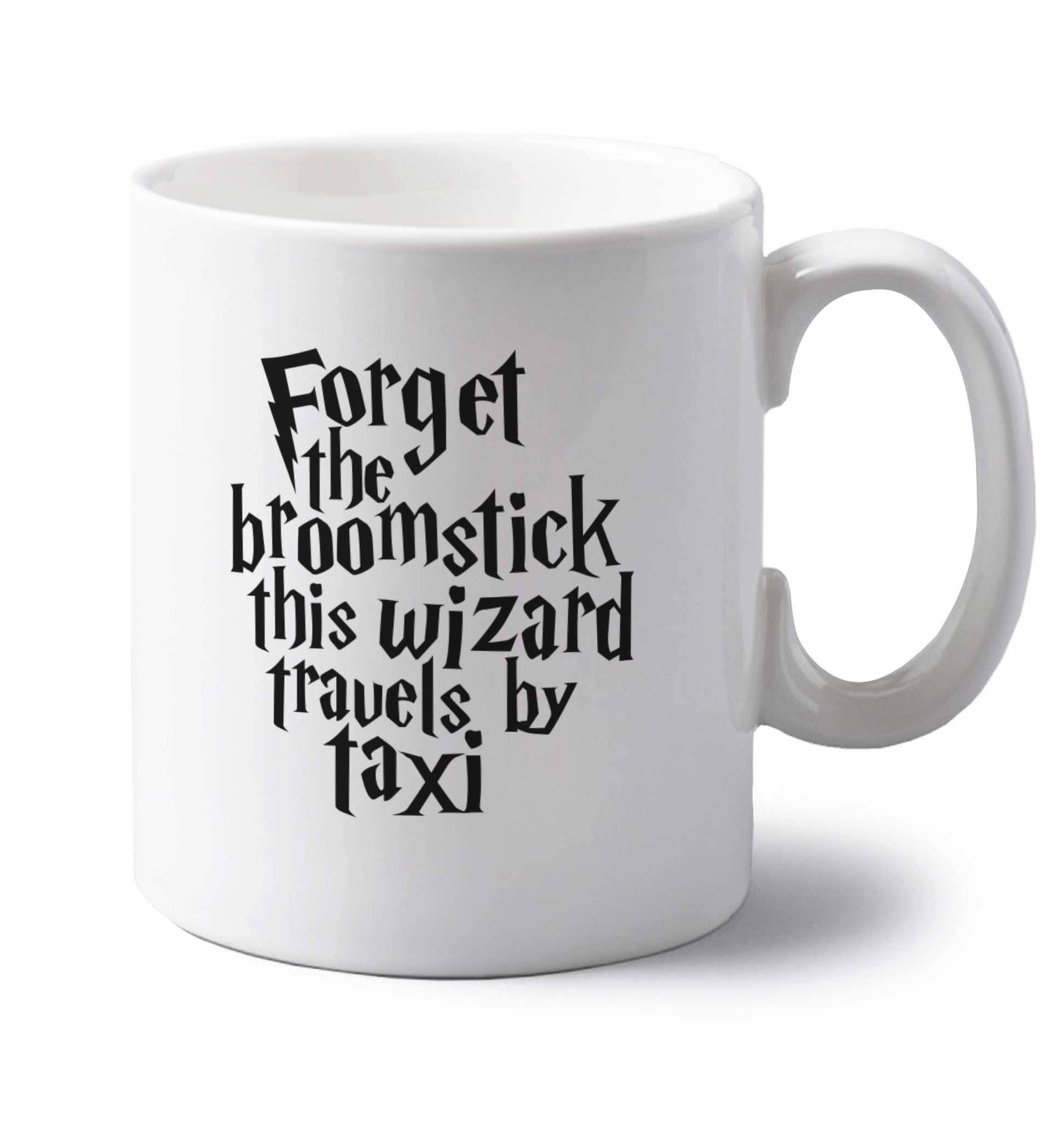 Forget the broomstick this wizard travels by taxi left handed white ceramic mug 