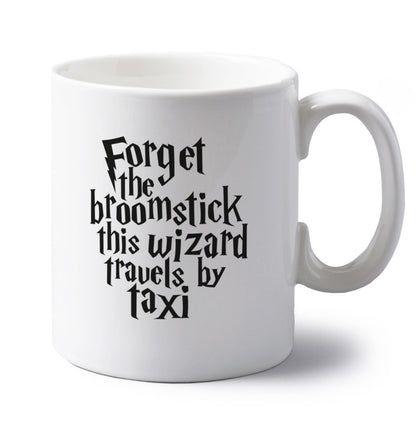 Forget the broomstick this wizard travels by taxi left handed white ceramic mug 