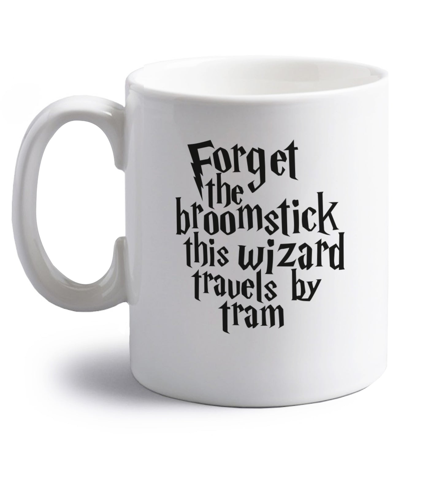 Forget the broomstick this wizard travels by tram right handed white ceramic mug 