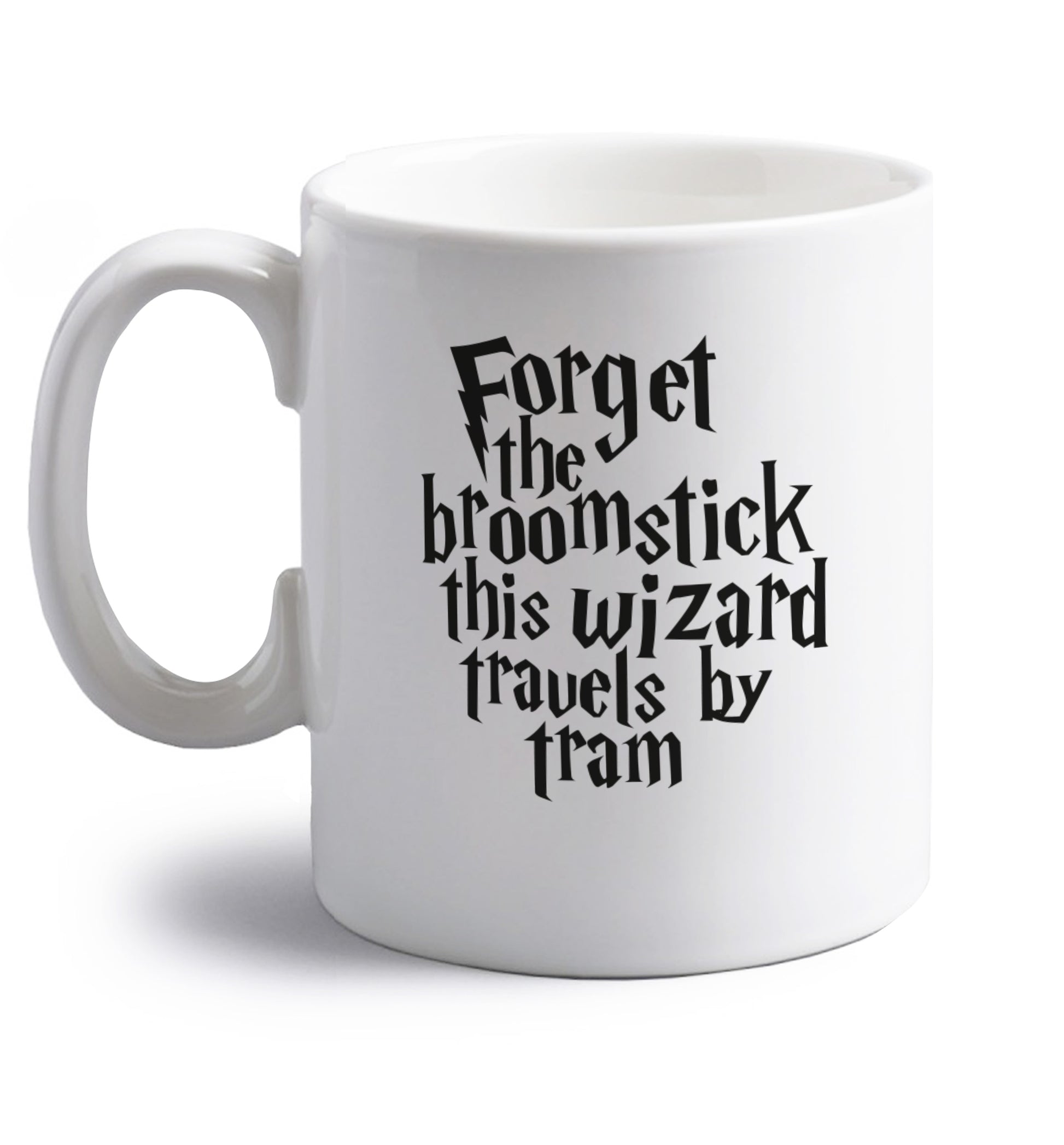 Forget the broomstick this wizard travels by tram right handed white ceramic mug 