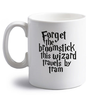Forget the broomstick this wizard travels by tram right handed white ceramic mug 