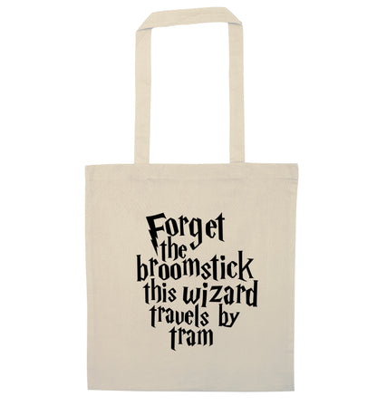 Forget the broomstick this wizard travels by tram natural tote bag