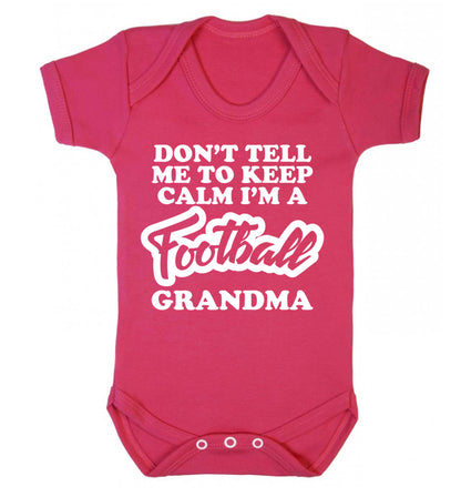 Don't tell me to keep calm I'm a football grandma Baby Vest dark pink 18-24 months