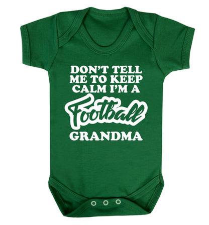 Don't tell me to keep calm I'm a football grandma Baby Vest green 18-24 months