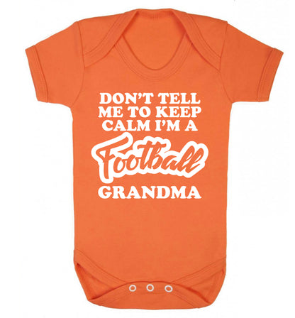 Don't tell me to keep calm I'm a football grandma Baby Vest orange 18-24 months