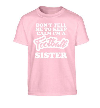 Don't tell me to keep calm I'm a football sister Children's light pink Tshirt 12-14 Years
