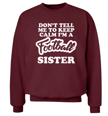 Don't tell me to keep calm I'm a football sister Adult's unisexmaroon Sweater 2XL