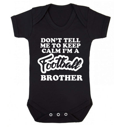 Don't tell me to keep calm I'm a football brother Baby Vest black 18-24 months
