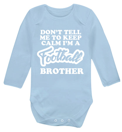 Don't tell me to keep calm I'm a football brother Baby Vest long sleeved pale blue 6-12 months